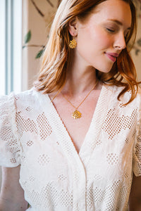 Model is wearing the Jardin Hydrangea Gold Hook earrings_m donohue collection