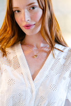 Load image into Gallery viewer, Model wears Dana Gold Heart Locket necklace_m donohue collection