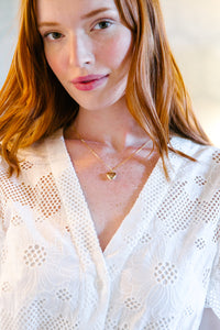 Model wears Dana Gold Heart Locket necklace_m donohue collection