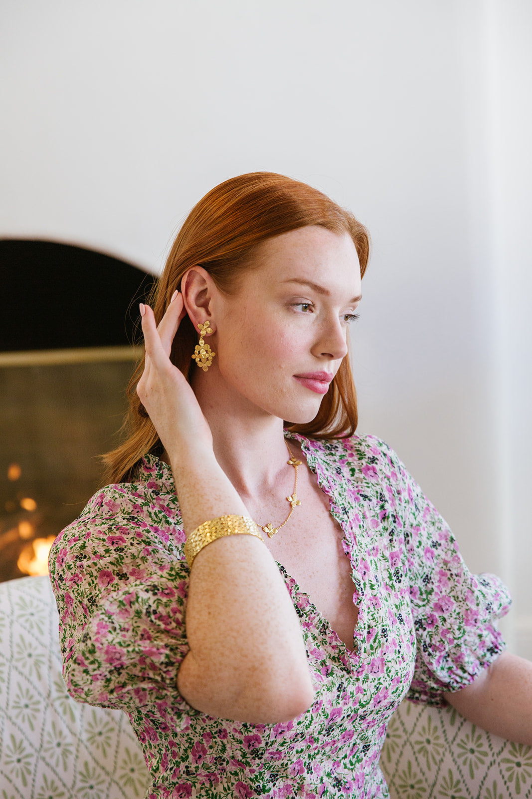 Model wears the Bloom Floral Cluster earrings_m donohue collection