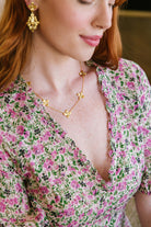 Model wears the Bloom Multi Flower necklace_m donohue collection