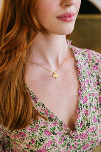 Model wears Bloom Single Flower necklace_m donohue collection