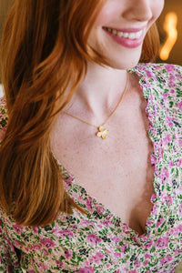 Model wears Bloom Single Flower necklace_m donohue collection