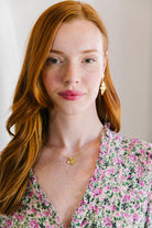 Model wears Bloom Single Flower necklace_m donohue collection