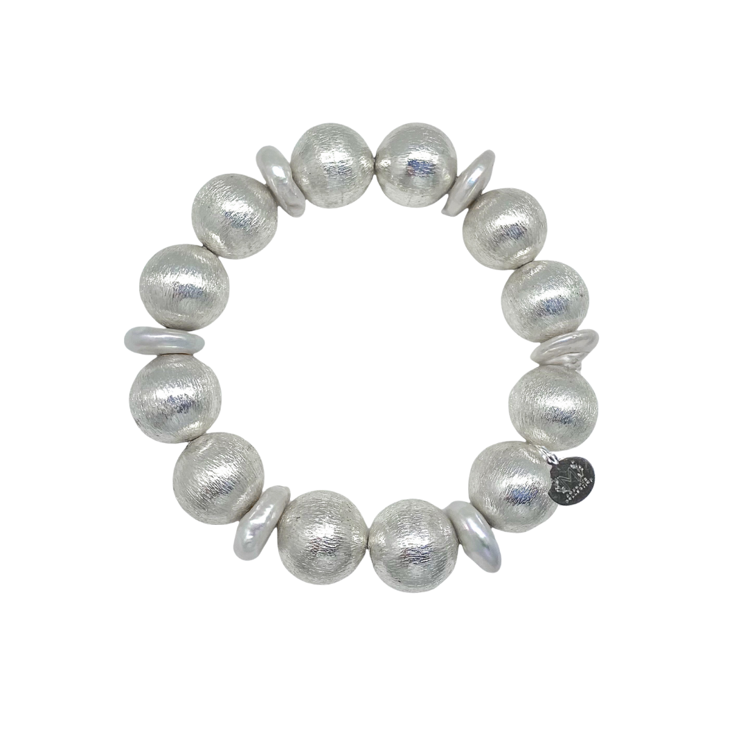 Stretch bracelet with silver- plated copper beads and freshwater coin pearls_m donohue collection