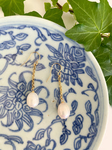 Holly Gold Pearl Earring displayed on blue porcelain dish_m donohue collection