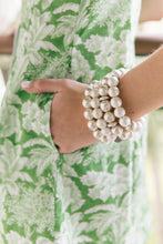 Load image into Gallery viewer, Model is wearing Olivia Cotton Pearl &amp; Gold Bracelet_m donohue collection